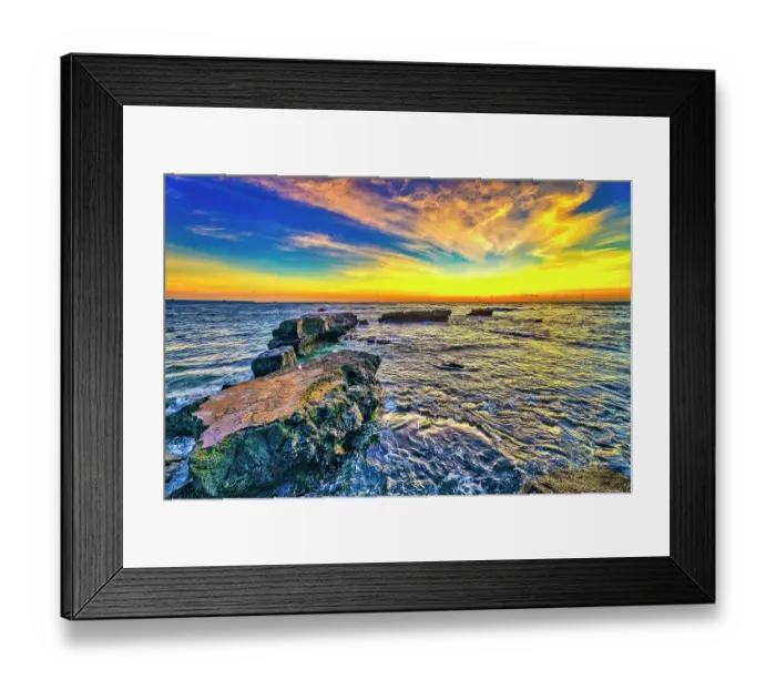 Framed Print : Bali's sunsets are often considered postcard-perfect, with their stunning colors and breathtaking scenery. Here is a Black and White at sunset high tide Framed Print : Bali's sunsets are often considered postcard-perfect, with their stunning colors and breathtaking scenery. Here is a Black and White at sunset high tide
