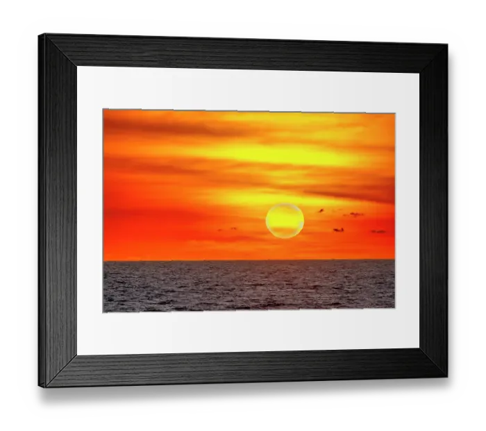 Framed Print : Bali's sunsets are often considered postcard-perfect, with their stunning colors and breathtaking scenery. Here is a Black and White at sunset high tide