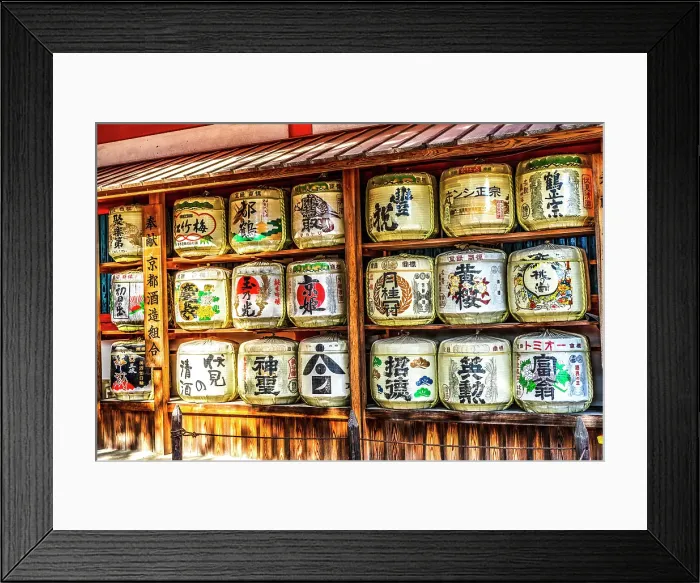Framed Print : Colorful sake barrels, Heian-jingu Shrine, Kyoto, Japan. Barrels are covered with woven straw opened for special celebration like wedding. (Editorial Use Only)