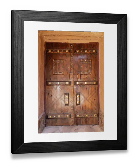 Framed Print : Ushaiger Heritage Village, Riyadh, Saudi Arabia. Decorative old wooden door Framed Print : Ushaiger Heritage Village, Riyadh, Saudi Arabia. Decorative old wooden door