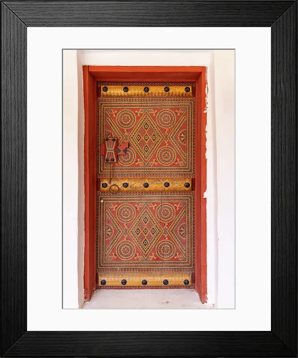 Framed Print : Saudi Arabia, Al-Qassim, Unaizah. Colorfully painted door. (Editorial Use Only)