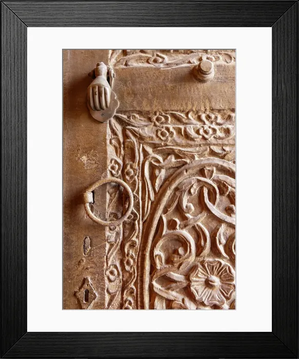 Framed Print : Saudi Arabia, Mecca, Jeddah, Al-Balad. Metal pull and knocker on a carved wooden door in the Al-Balad historical district Framed Print : Saudi Arabia, Mecca, Jeddah, Al-Balad. Metal pull and knocker on a carved wooden door in the Al-Balad historical district