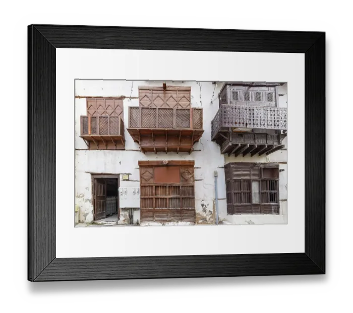 Framed Print : Saudi Arabia, Mecca, Jeddah, Al-Balad. Traditional Hijazi tower house with wooden Roshan windows and balconies Framed Print : Saudi Arabia, Mecca, Jeddah, Al-Balad. Traditional Hijazi tower house with wooden Roshan windows and balconies