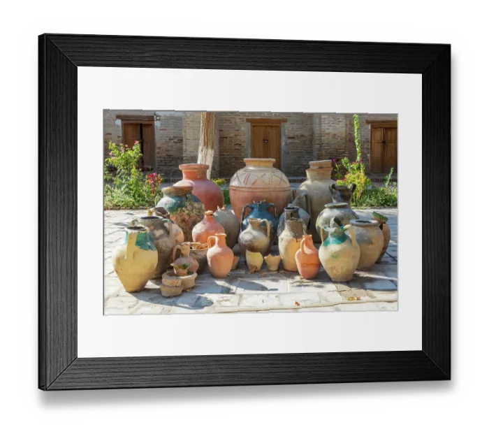 Framed Print : Bukhara, Uzbekistan, Central Asia. Variety of pots in a courtyard in Bukhara