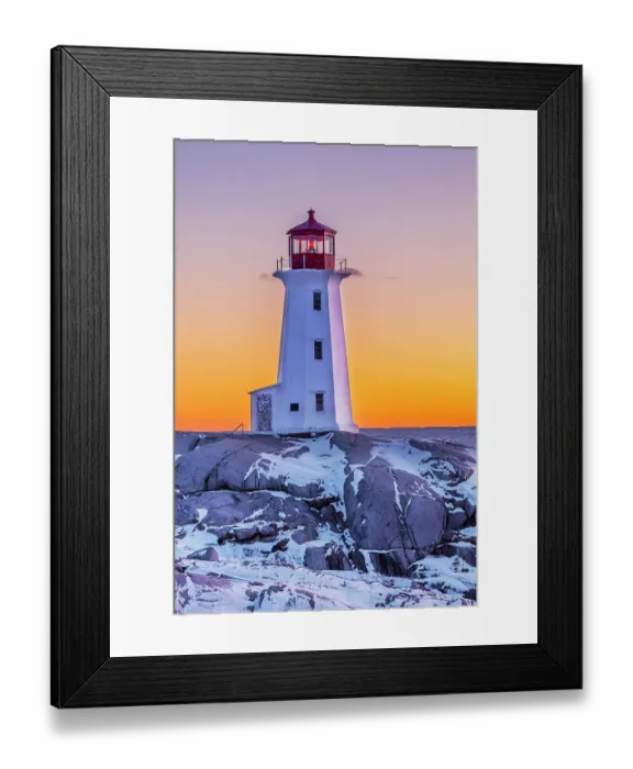 Framed Print : Peggy's Cove Lighthouse in winter at sunset, Nova Scotia, Canada. (Editorial Use Only) Framed Print : Peggy's Cove Lighthouse in winter at sunset, Nova Scotia, Canada. (Editorial Use Only)