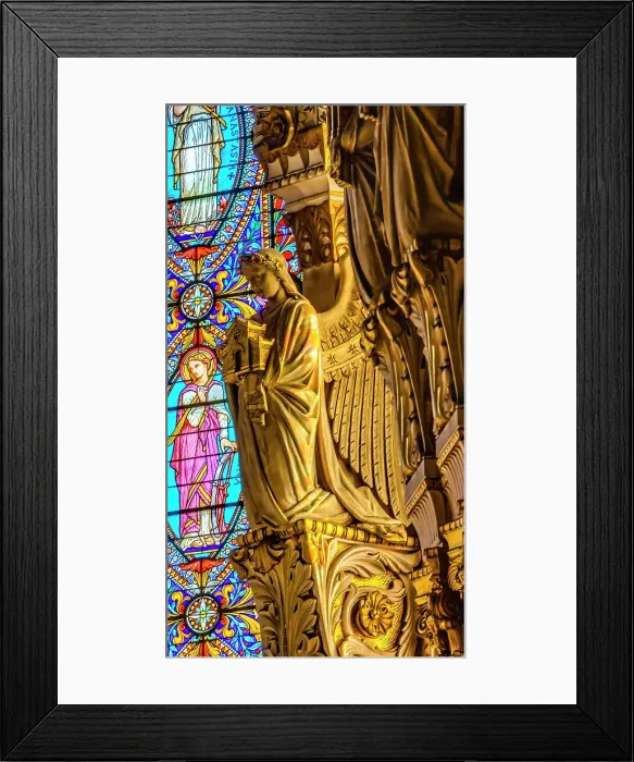 Framed Print : Angel statue colorful stained glass, Basilica of Notre Dame de Fourviere, Lyon, France. Built from 1872 to 1896. (Editorial Use Only)