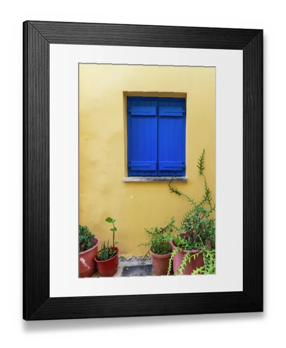 Framed Print : Greece, Crete, Chania harbor, old town. Blue shutters in yellow wall Framed Print : Greece, Crete, Chania harbor, old town. Blue shutters in yellow wall