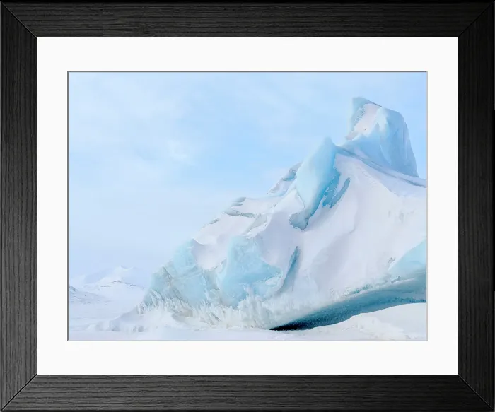 Framed Print : Iceberg in the frozen Mohnbukta in Sabine-Land. The island Spitzbergen in the Svalbard. Scandinavia, Norway Framed Print : Iceberg in the frozen Mohnbukta in Sabine-Land. The island Spitzbergen in the Svalbard. Scandinavia, Norway