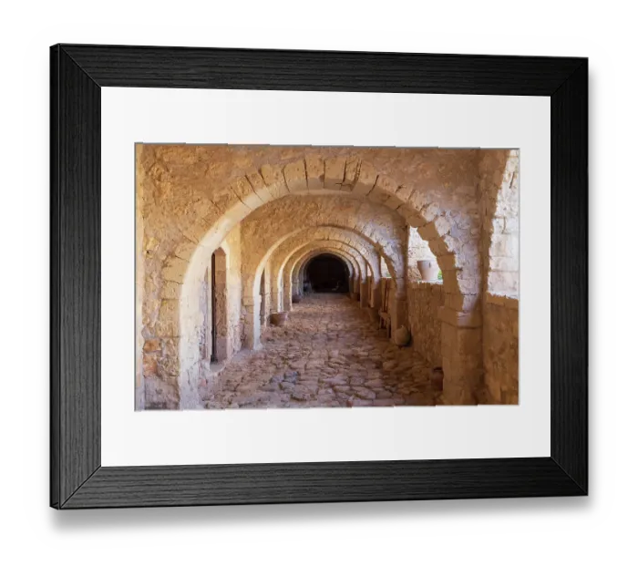 Framed Print : Greece, Crete, Rethymno. Venetian Baroque, 16th century Eastern Orthodox Monastery. The Holy Monastery of Arkadi. Arched stone passageway