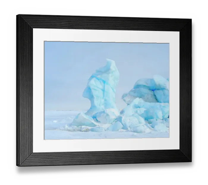 Framed Print : Iceberg in the frozen Mohnbukta in Sabine-Land. The island Spitzbergen in the Svalbard. Scandinavia, Norway Framed Print : Iceberg in the frozen Mohnbukta in Sabine-Land. The island Spitzbergen in the Svalbard. Scandinavia, Norway
