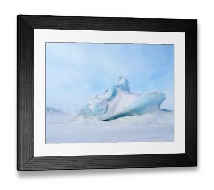 Framed Print : Iceberg in the frozen Mohnbukta in Sabine-Land. The island Spitzbergen in the Svalbard. Scandinavia, Norway Framed Print : Iceberg in the frozen Mohnbukta in Sabine-Land. The island Spitzbergen in the Svalbard. Scandinavia, Norway