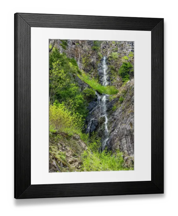 Framed Print : North Cascades National Park, Washington State, USA. Waterfalls in springtime, with trees and shrubs clinging to the steep granite cliff Framed Print : North Cascades National Park, Washington State, USA. Waterfalls in springtime, with trees and shrubs clinging to the steep granite cliff