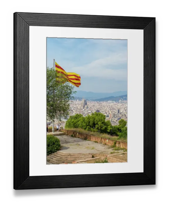 Framed Print : Catalan flag flies over the Montjuic Castle old military fortress on Montjuic Mountain overlooking the city, Barcelona, Spain
