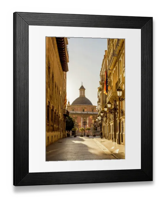 Framed Print : Narrow cobblestone street and Cathedral Dome near Placa de la Mare de Deu, Valencia, Spain