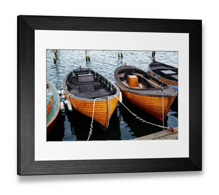 Framed Print : Row of wooden moored small boats, Kyrkbacken, Sweden