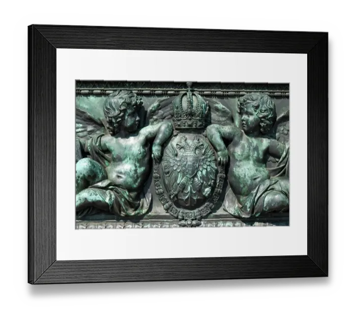 Framed Print : Vienna, Austria. Bronze detail of angels and royal crest