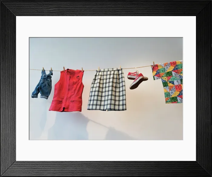 Framed Print : Brussels, Belgium. Second hand clothes for sale at thrift store. (Editorial Use Only) Framed Print : Brussels, Belgium. Second hand clothes for sale at thrift store. (Editorial Use Only)