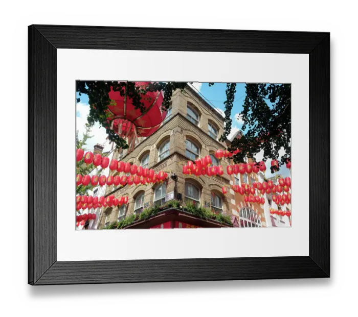 Framed Print : London, England, Great Britain. Chinatown district where red lanterns are found everywhere, old phone booths and souvenirs are found everywhere. (Editorial Use Only) Framed Print : London, England, Great Britain. Chinatown district where red lanterns are found everywhere, old phone booths and souvenirs are found everywhere. (Editorial Use Only)