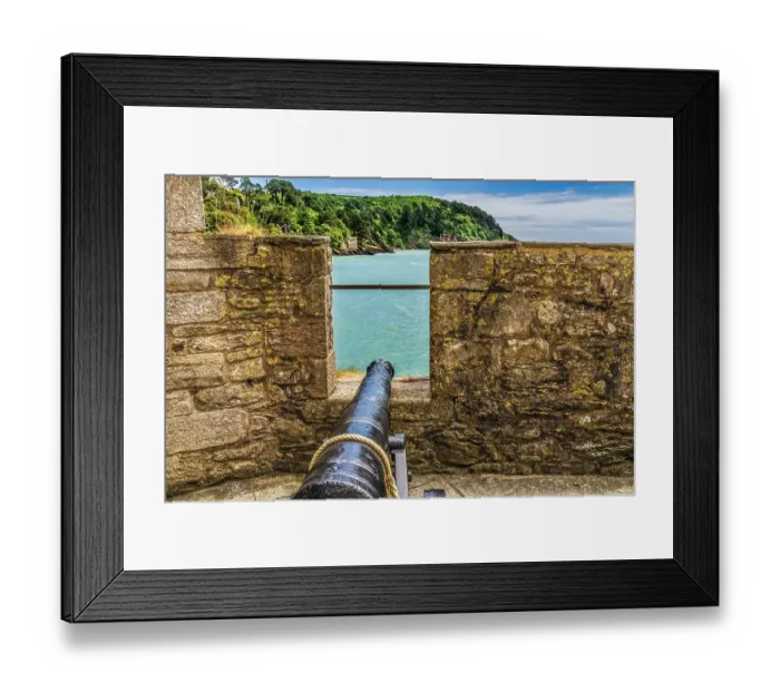 Framed Print : Cannon at Dartmouth Castle, Kingswear, Devon, England. Castle originally built 1300's to protect harbor and River Dart. In 1400's castle expanded and iron chain to Kingswear to protect harbor Framed Print : Cannon at Dartmouth Castle, Kingswear, Devon, England. Castle originally built 1300's to protect harbor and River Dart. In 1400's castle expanded and iron chain to Kingswear to protect harbor
