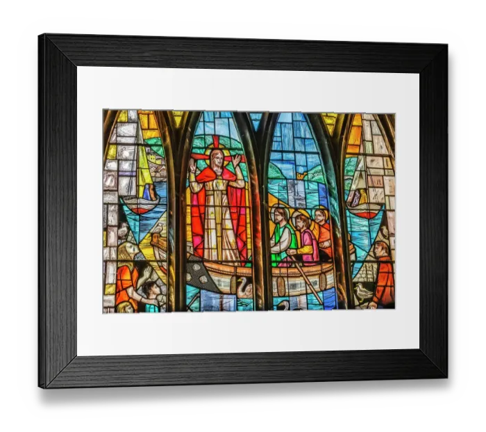 Framed Print : Colorful stained glass Jesus preaching disciples, Sea of Galilee, St. Saviour's Church, Dartmouth, Devon, England. Church originally founded in 1372. (Editorial Use Only) Framed Print : Colorful stained glass Jesus preaching disciples, Sea of Galilee, St. Saviour's Church, Dartmouth, Devon, England. Church originally founded in 1372. (Editorial Use Only)