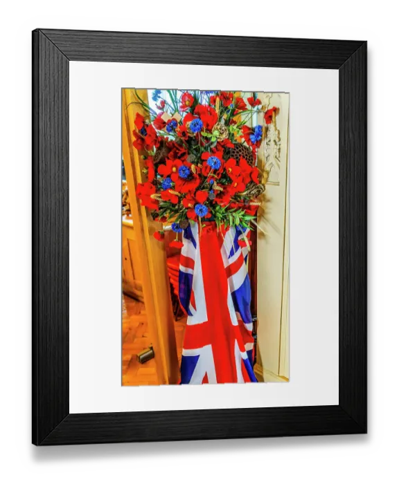 Framed Print : Colorful D-Day memorial flowers poppies, UK Flag, St. Saviour's Church, Dartmouth, Devon, England. Church originally founded in 1372. (Editorial Use Only)