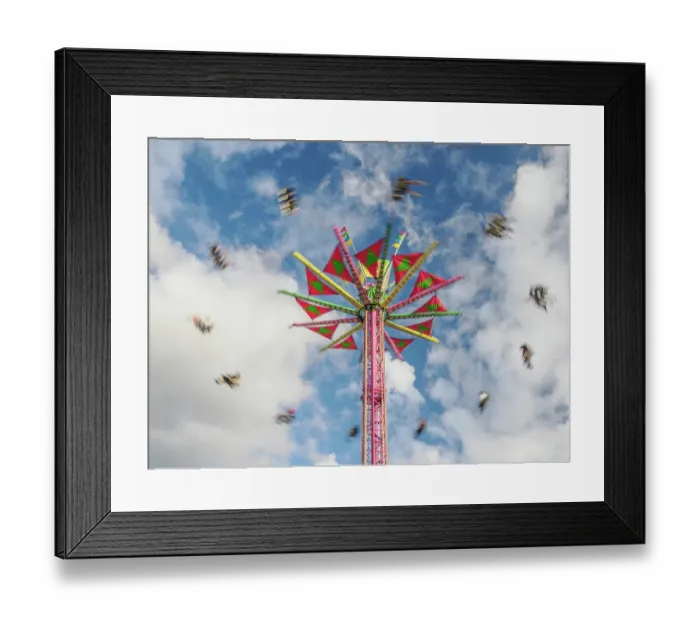 Framed Print : Motion blur of Swing (or Chair Swing) ride at a fair