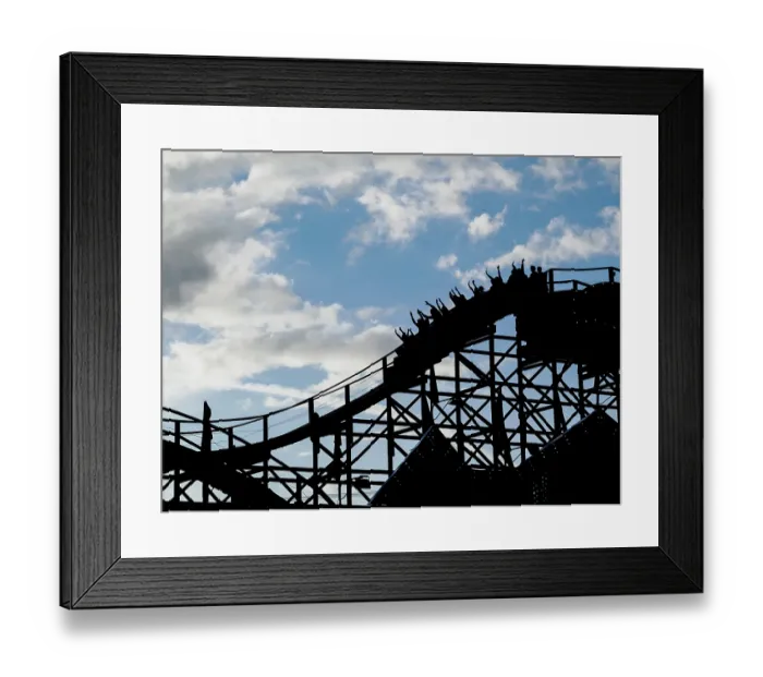 Framed Print : Silhouette of people raising their hands on a roller coaster Framed Print : Silhouette of people raising their hands on a roller coaster
