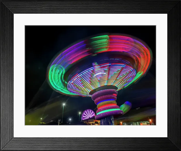 Framed Print : Colorful motion blur of spinning ride at a carnival Framed Print : Colorful motion blur of spinning ride at a carnival