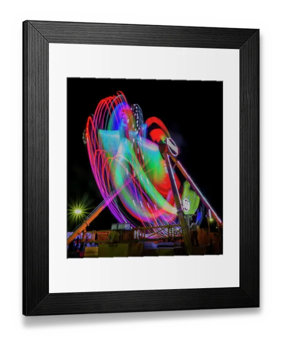 Framed Print : Colorful motion blur of spinning ride at a carnival Framed Print : Colorful motion blur of spinning ride at a carnival