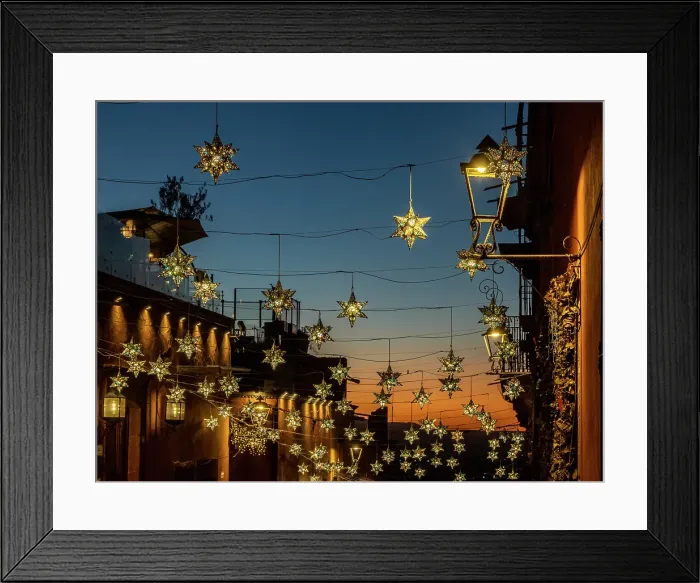 Framed Print : Mexico, San Miguel de Allende. Lighted stars suspended over a street at sunset Framed Print : Mexico, San Miguel de Allende. Lighted stars suspended over a street at sunset