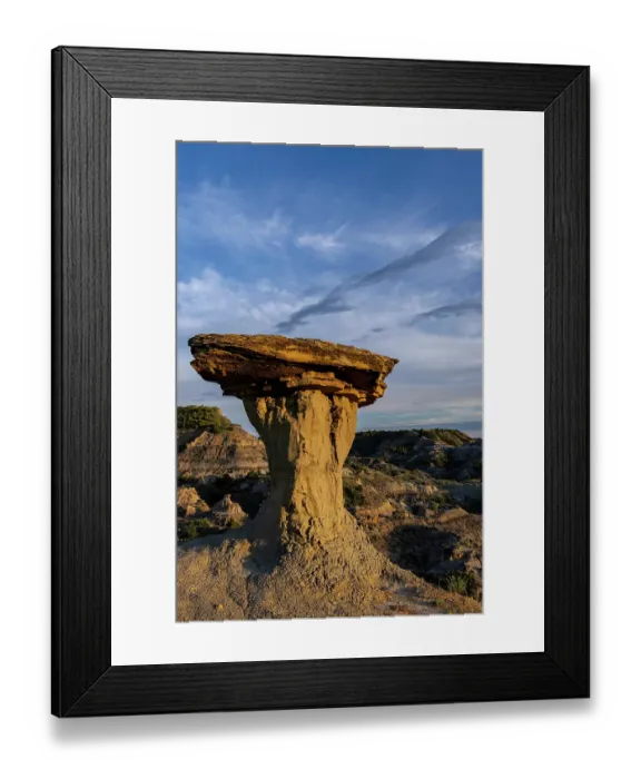 Framed Print : Caprock formation in the badlands of Makoshika State Park in Glendive, Montana, USA. (Editorial Use Only)