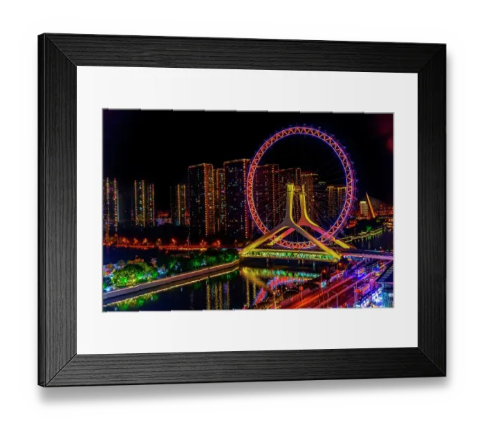 Framed Print : Colorful large ferris wheel over Yongle Bridge, Tianjin, China. Built in 2007 Framed Print : Colorful large ferris wheel over Yongle Bridge, Tianjin, China. Built in 2007