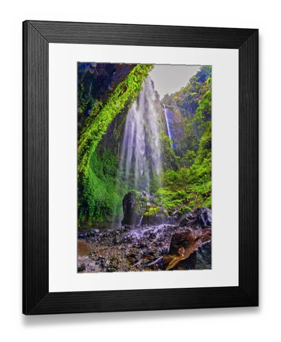Framed Print : Tumpak Sewu is a breathtaking panoramic cascade plunging over a cliff into a turquoise pool below. It is located near Lumajang and is an adventurous hike through a Jurassic Park like canyon with multiple waterfalls Framed Print : Tumpak Sewu is a breathtaking panoramic cascade plunging over a cliff into a turquoise pool below. It is located near Lumajang and is an adventurous hike through a Jurassic Park like canyon with multiple waterfalls