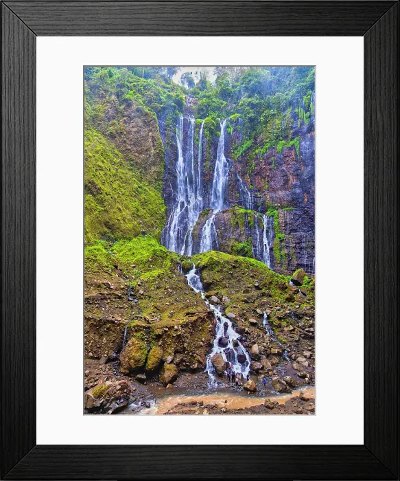 Framed Print : Tumpak Sewu is a breathtaking panoramic cascade plunging over a cliff into a turquoise pool below. It is located near Lumajang and is an adventurous hike through a Jurassic Park like canyon with multiple waterfalls