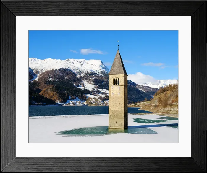 Framed Print : The steeple of village Alt-Graun in lake Reschensee, one of the icons of Vinschgau (Val Venosta). Italy, Sudtirol, Alto Adige