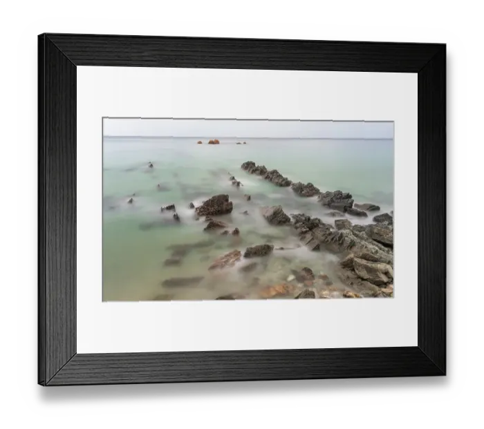 Framed Print : Spain, Playa de Aguilar. Rock formations on ocean shore