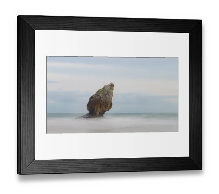 Framed Print : Spain, Playa Buelna. Lone ocean sea stack on misty coastline Framed Print : Spain, Playa Buelna. Lone ocean sea stack on misty coastline