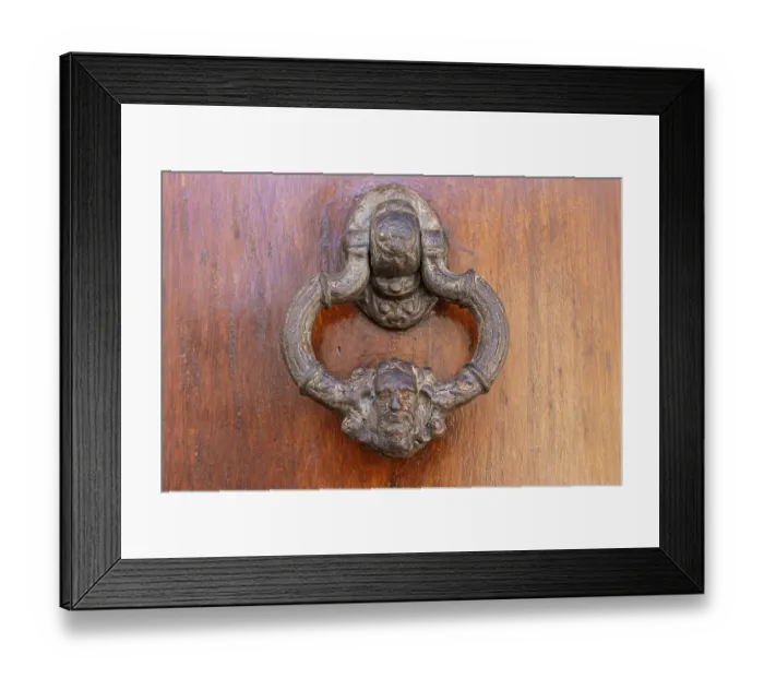 Framed Print : Albaicin, Province of Granada, Andalusia, Spain. An old metal knocker decorated with a human head, on a wooden door Framed Print : Albaicin, Province of Granada, Andalusia, Spain. An old metal knocker decorated with a human head, on a wooden door