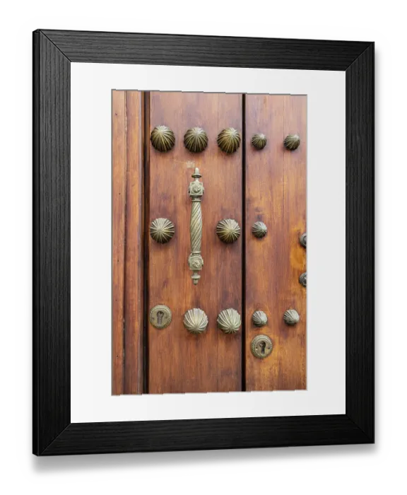 Framed Print : Centro District, Cordoba, Andalusia, Spain. Brass handle and decorations on an old Spanish building Framed Print : Centro District, Cordoba, Andalusia, Spain. Brass handle and decorations on an old Spanish building