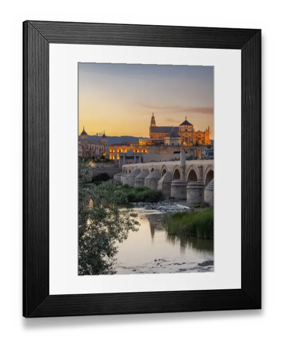 Framed Print : Sur District, Cordoba, Andalusia, Spain. Evening view of the San Rafael Bridge and the Cordoba Cathedral Framed Print : Sur District, Cordoba, Andalusia, Spain. Evening view of the San Rafael Bridge and the Cordoba Cathedral