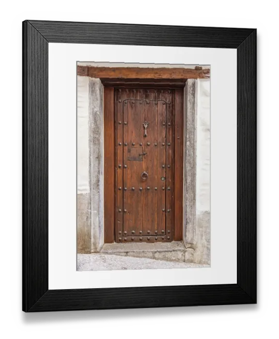 Framed Print : Albaicin, Province of Granada, Andalusia, Spain. An old wooden door on a building Framed Print : Albaicin, Province of Granada, Andalusia, Spain. An old wooden door on a building