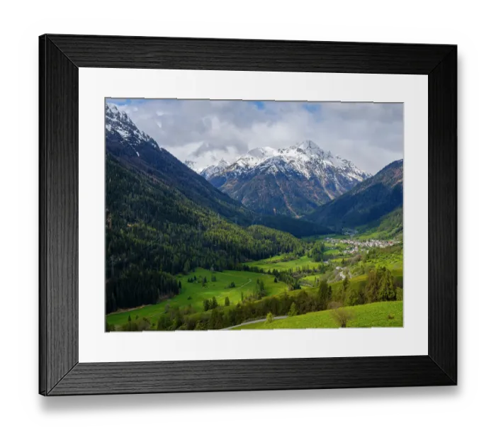 Framed Print : View towards village Lavin in the Lower Engadin in Grisons, Switzerland Framed Print : View towards village Lavin in the Lower Engadin in Grisons, Switzerland