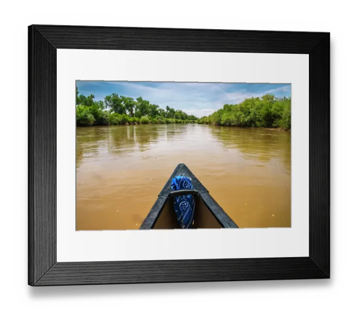Framed Print : USA, New Mexico, Rio Grande River. Bow of canoe on river Framed Print : USA, New Mexico, Rio Grande River. Bow of canoe on river