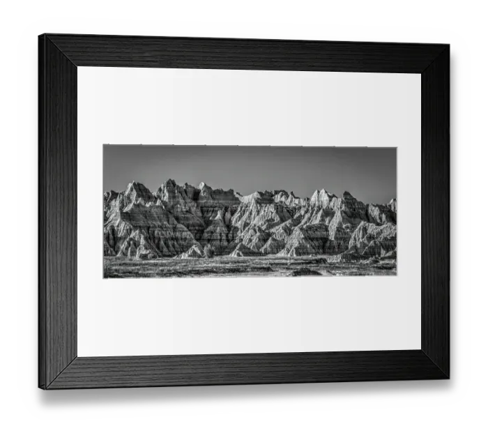 Framed Print : The wind and water eroded landscape in the Badlands National Park seem desolate but make for beautiful natural carvings. USA