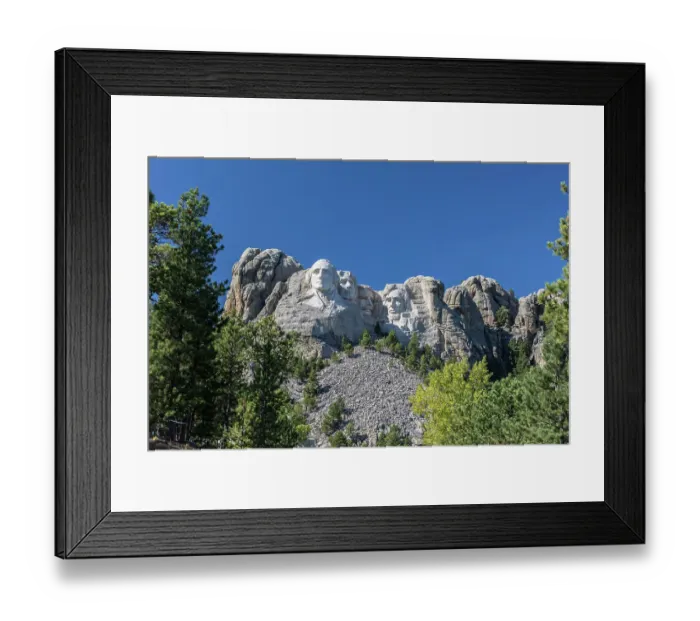 Framed Print : The granite stone carvings of four US presidents called Mount Rushmore National Memorial, rise up from the Black Hill of western South Dakota, USA Framed Print : The granite stone carvings of four US presidents called Mount Rushmore National Memorial, rise up from the Black Hill of western South Dakota, USA