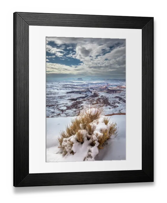 Framed Print : A light snowfall and contrasting orange-colored terrain define the rugged landscape of Canyonlands National Park Framed Print : A light snowfall and contrasting orange-colored terrain define the rugged landscape of Canyonlands National Park