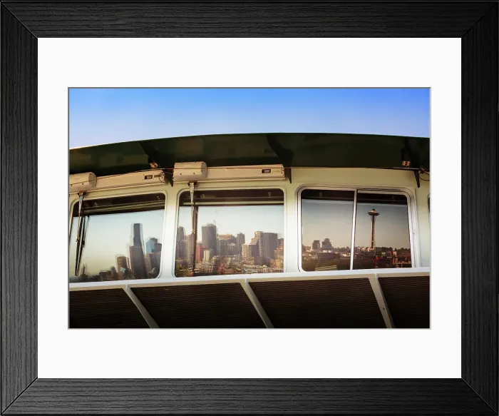 Framed Print : Reflection of Seattle skyline waterfront in ferry window, Washington State, USA Framed Print : Reflection of Seattle skyline waterfront in ferry window, Washington State, USA