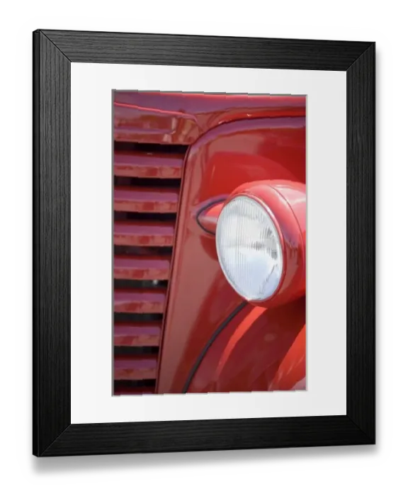 Framed Print : USA, Maine, Owls Head. Headlight and partial grill of a red antique truck. Credit as