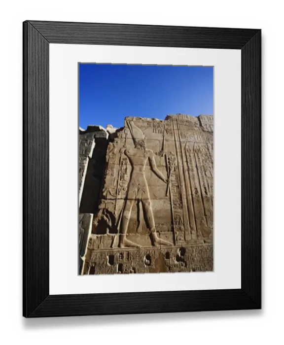 Framed Print : Ancient hieroglyphs on wall, Temple of Karnak, located at modern day Luxor or ancient Thebes Framed Print : Ancient hieroglyphs on wall, Temple of Karnak, located at modern day Luxor or ancient Thebes