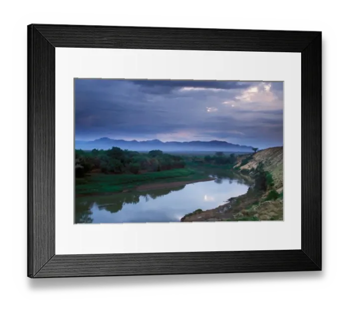 Framed Print : A stormy morning, with threatening clouds hanging in the air over the Omo River